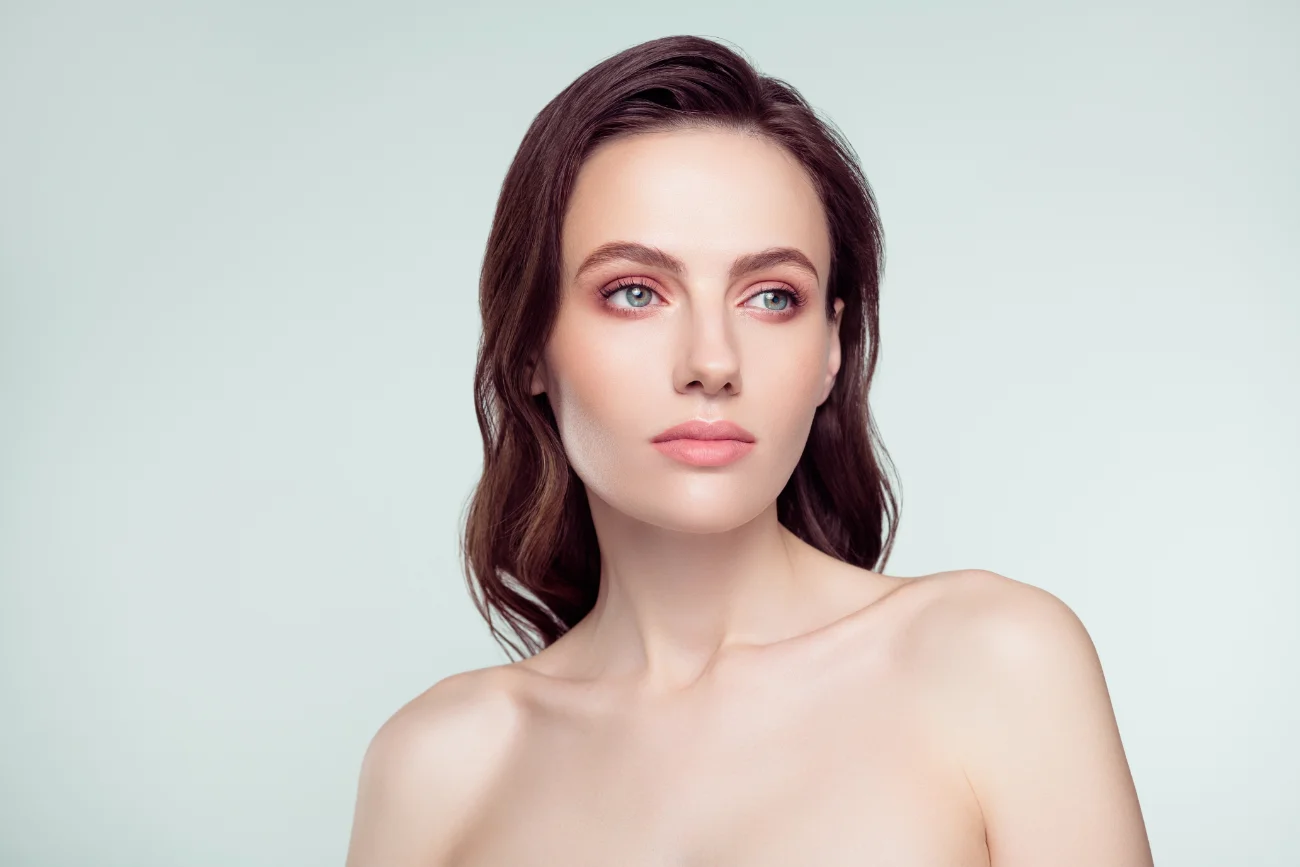 Photo portrait of pretty young girl charming stunning spa salon isolated on light gray color background.