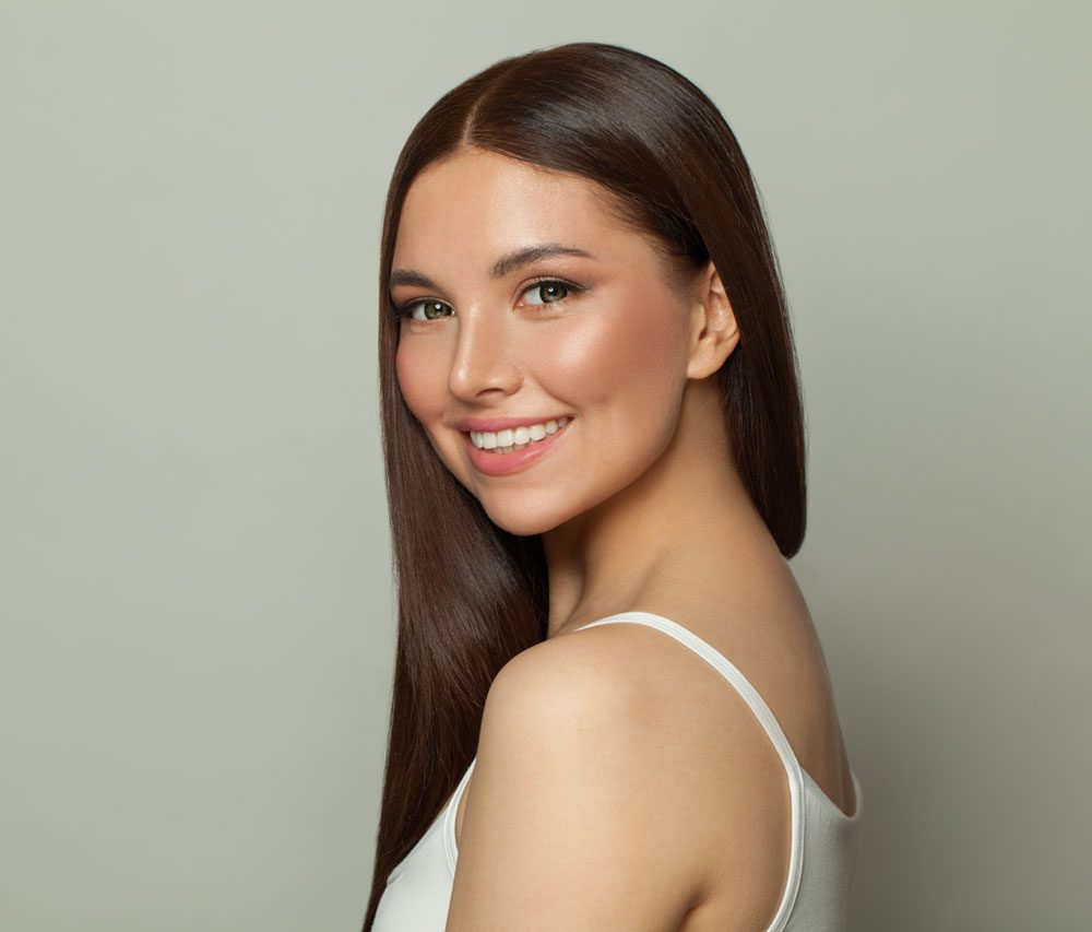 Young brunette model woman clear skin